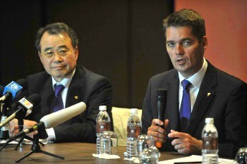 Dr. Kang Young Joong (left) introduces his successor, newly elected BWF President Poul-Erik Hoyer, to the media at a Press conference following the BWF Annual General Meeting